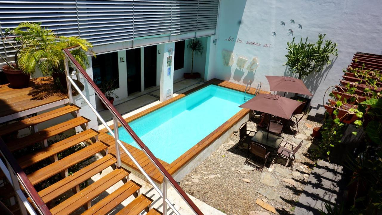 Casa Ticul Hotel Boutique - 5Th Ave (Adults Only) Playa del Carmen Bagian luar foto A swimming pool in a courtyard